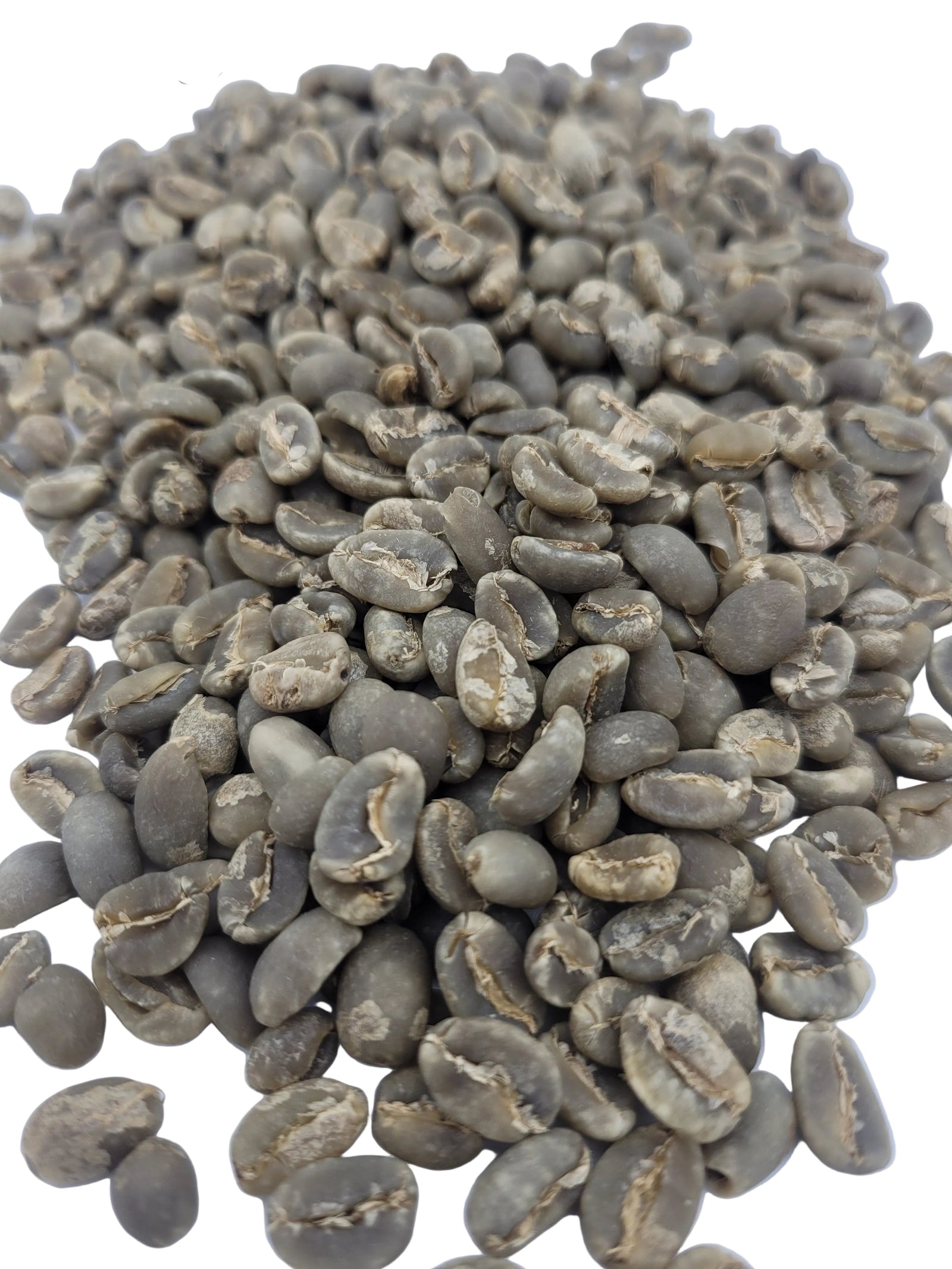 Pile of green coffee beans on a white background