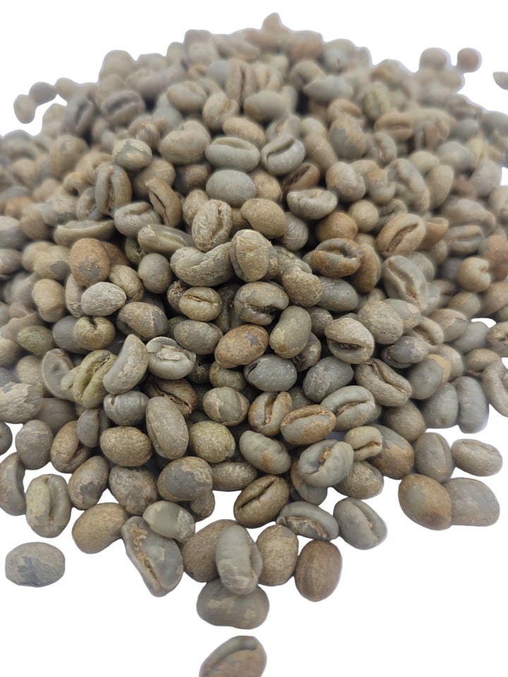 Brazilian Green Peaberry Coffee Beans on White background
