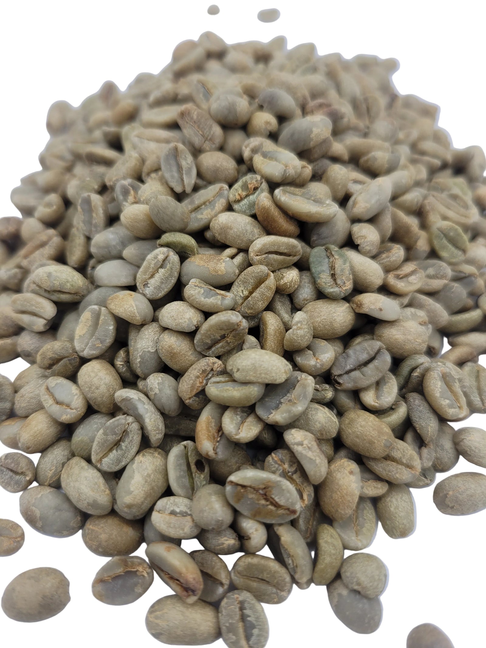 Close-up of green coffee beans on a white background