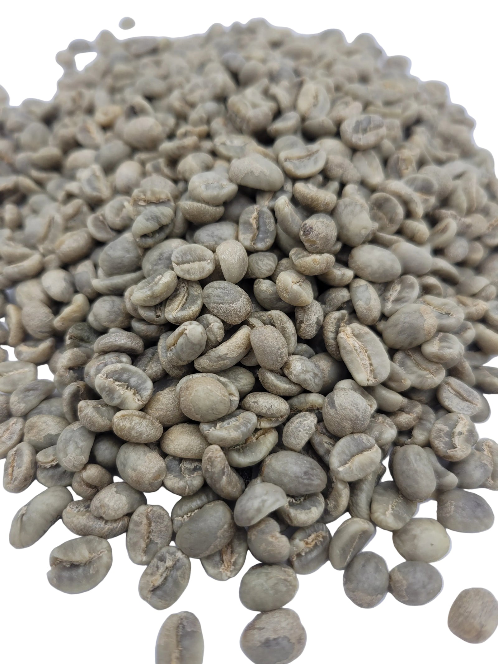 Green coffee beans on a white background