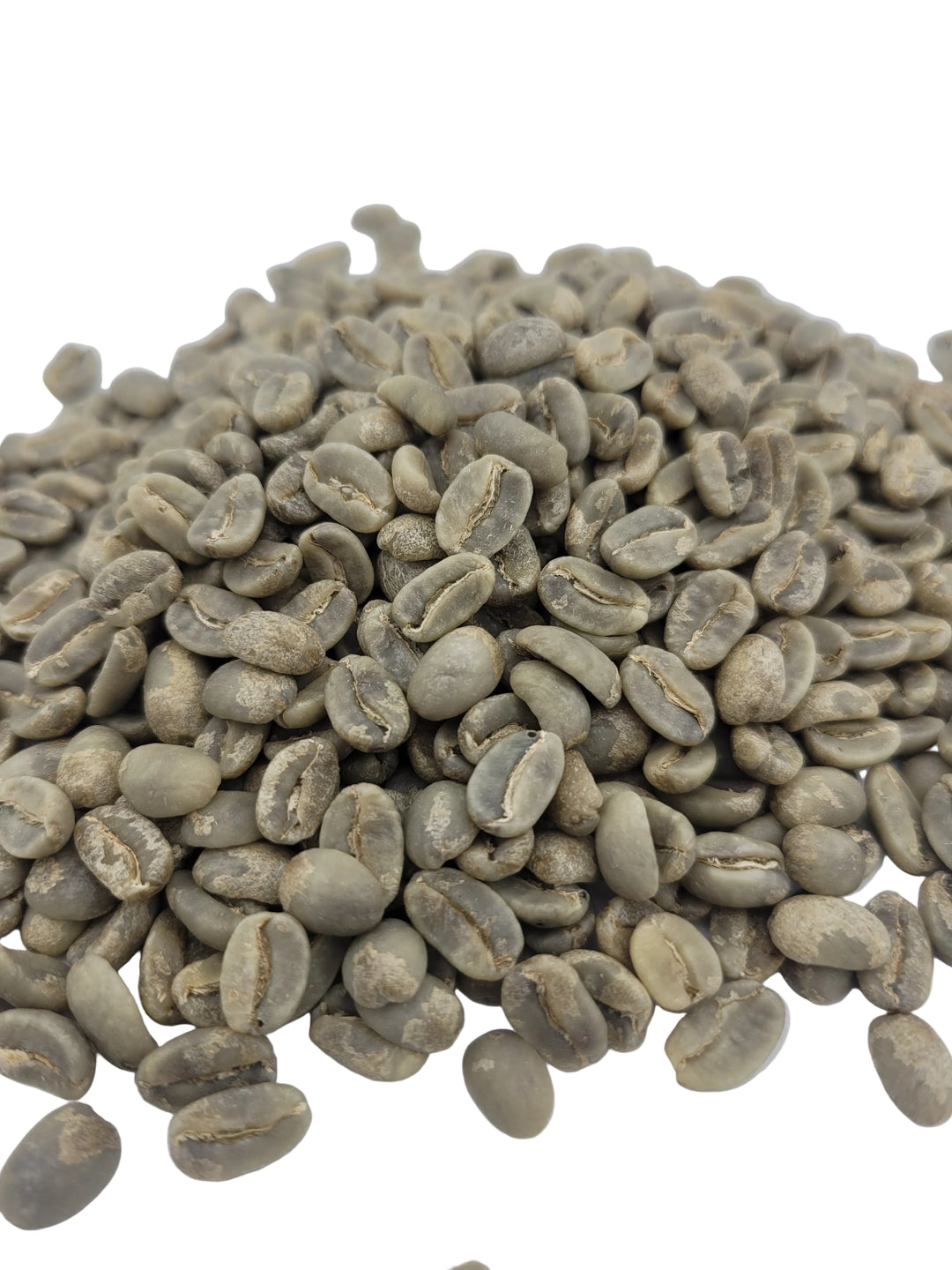 Green coffee beans on a white background